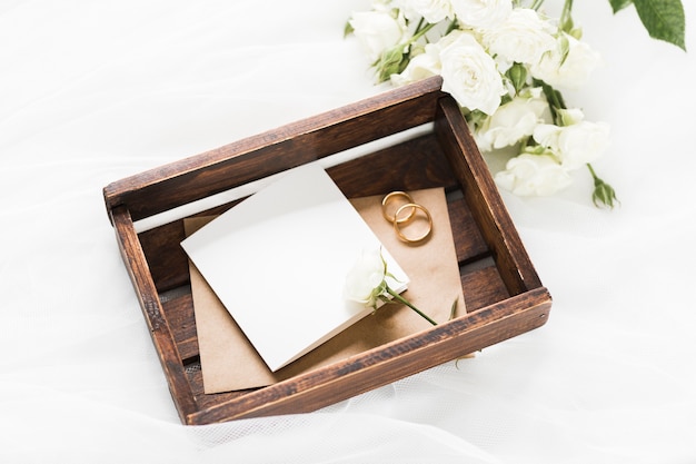 Free photo high angle box with engagement rings