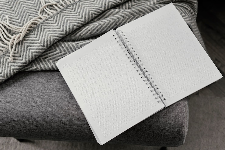 無料Photo ハイアングル点字ノートと毛布
