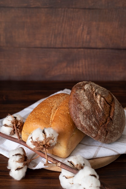 High angle bread and cotton flowers