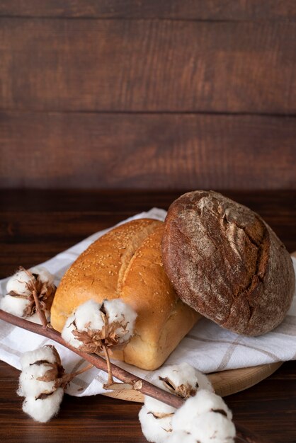 High angle bread and cotton flowers