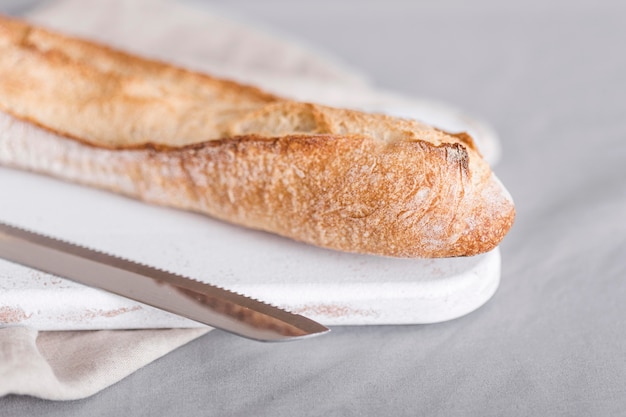 Free photo high angle bread with knife