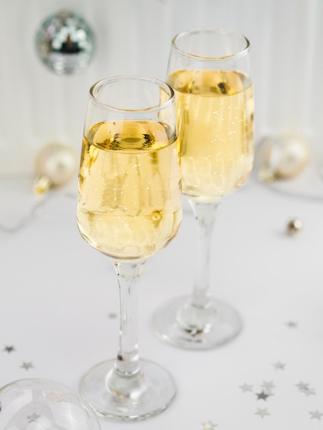 High angle of bubbly glasses of champagne