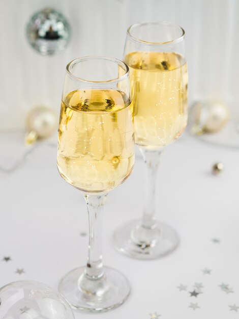 High angle of bubbly glasses of champagne