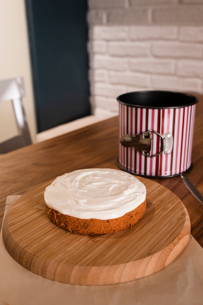 High angle of cake with cream topping