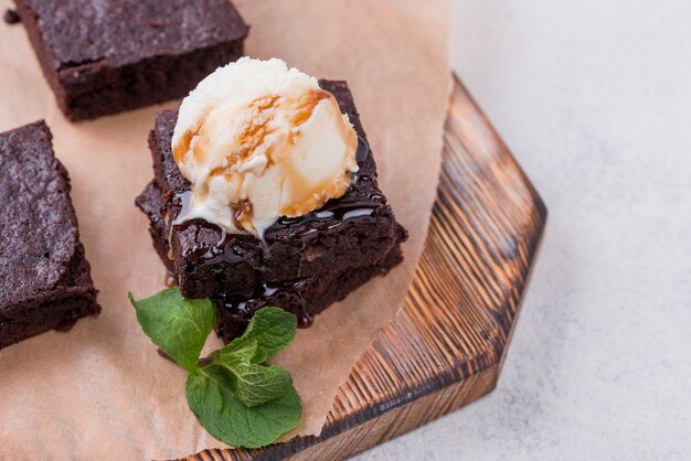 High angle of cake with mint and topping