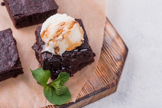 High angle of cake with mint and topping