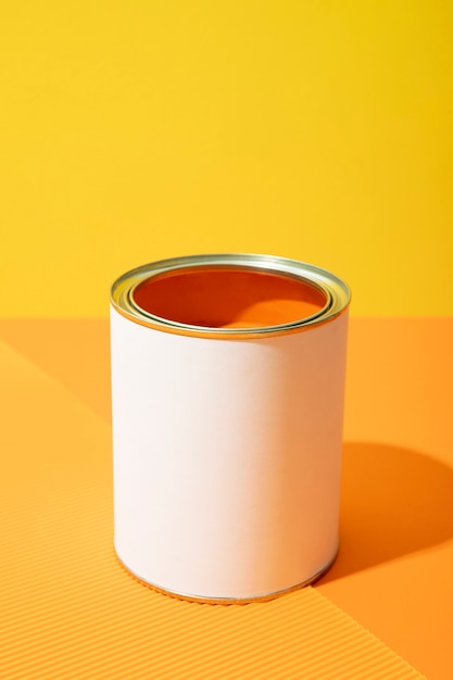 Free photo high angle can with orange paint