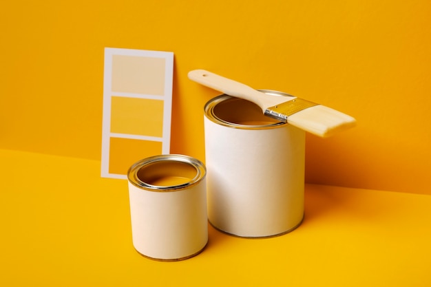 High angle cans with yellow paint arrangement