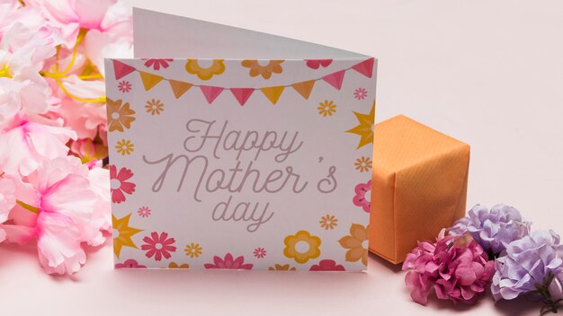 High angle of card and flowers for mothers day