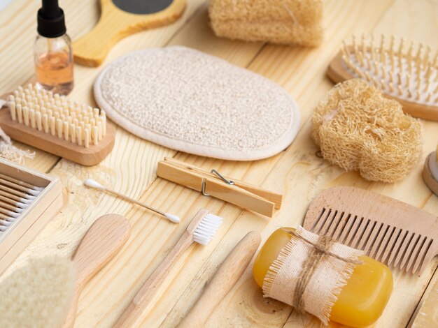 High angle care products on wooden background