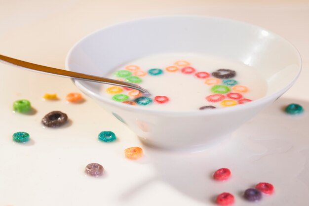 High angle cereals on table and bowl with cereals