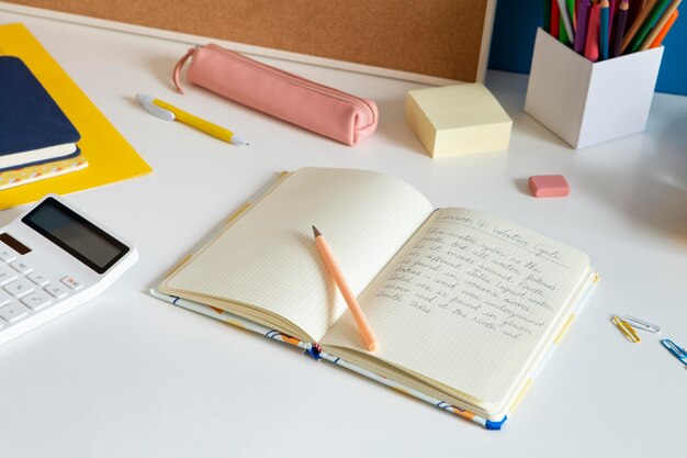 High angle of children's desk with notebook