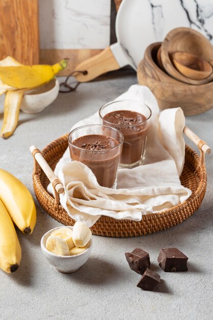 High angle chocolate smoothie with bananas