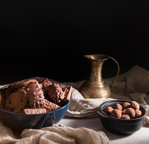 High angle chocolate sweets assortment in bowls