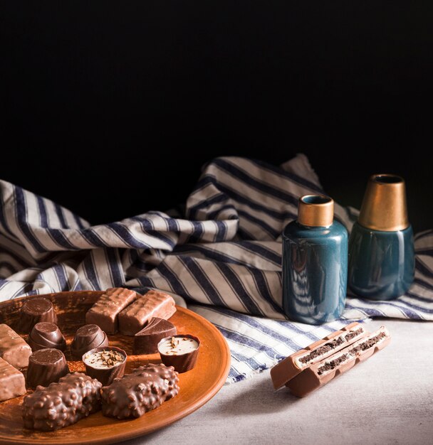 High angle chocolate sweets assortment on plate