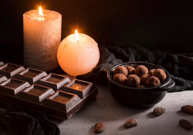 High angle chocolate sweets and candles