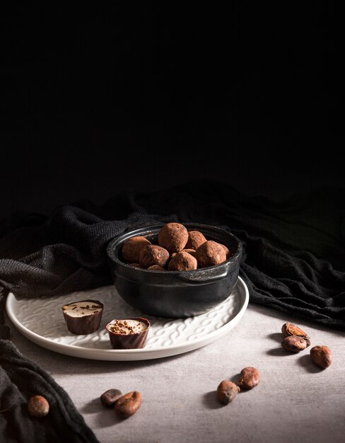 High angle chocolate truffles in bowls