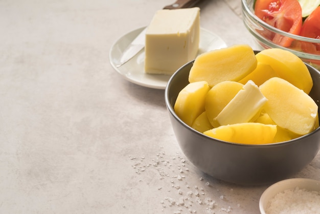 High angle chopped potato in bowl with copy space