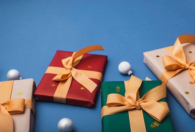 High angle of christmas presents with ribbon