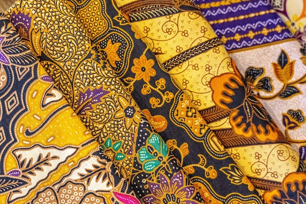 High angle closeup shot of colorful textiles with beautiful Asian patterns