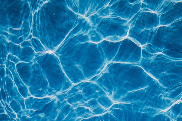 High angle closeup shot of a crystal clear swimming pool water