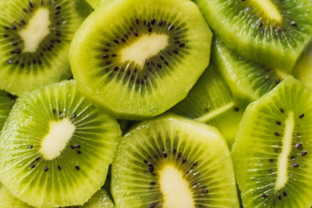 High angle closeup shot of delicious sliced kiwi fruits