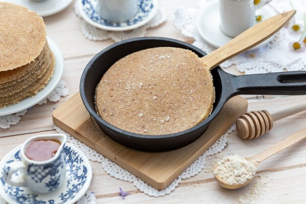 High angle closeup shot of raw vegan pancakes in an aesthetic table design