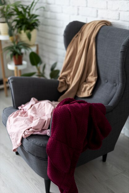 High angle clothes on chair