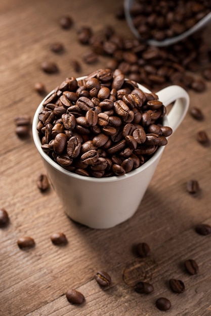 High angle coffee beans in mug