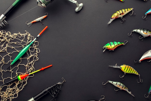 Free photo high angle of colorful fishing bait with net