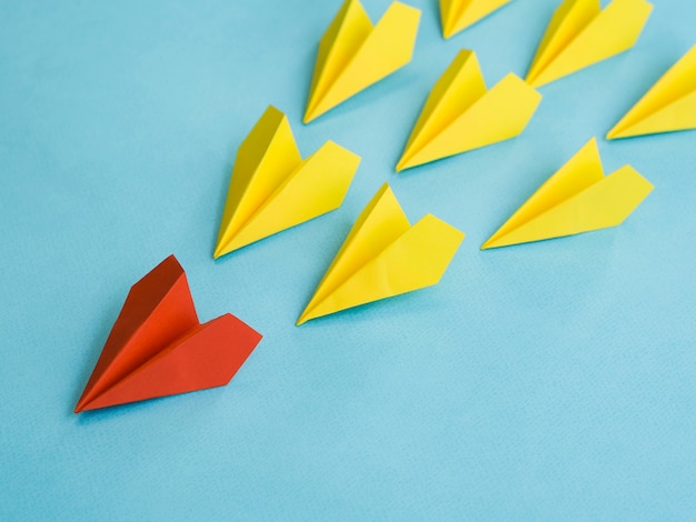 High angle of colorful paper planes