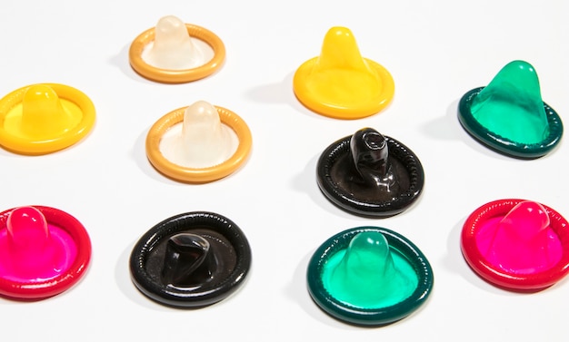 High angle colourful and transparent condoms