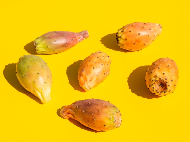 High angle composition with vegetables and yellow background