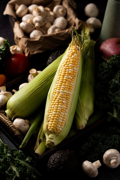 Free photo high angle corn and mushrooms