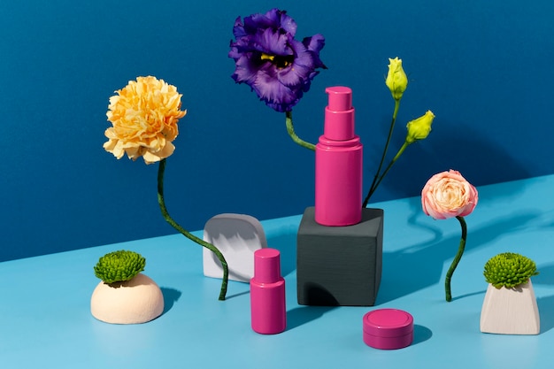High angle cosmetics containers and flowers