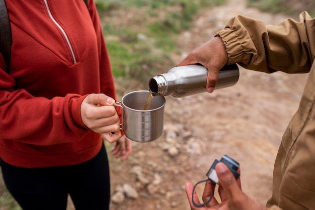 Free photo high angle couple on a hiking trip