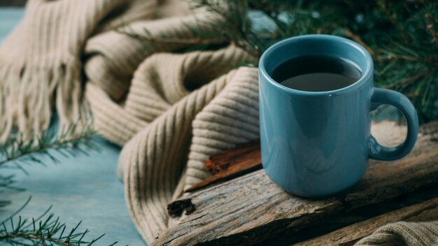 High angle cozy arrangement with scarf and mug