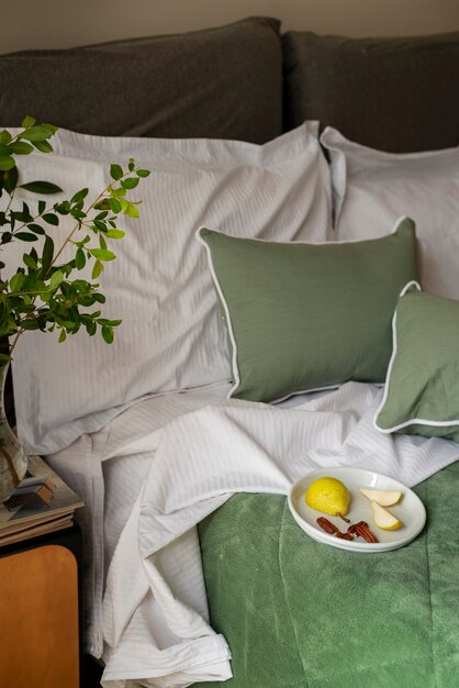 High angle cozy bed arrangement with breakfast