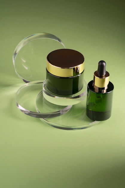 High angle cream container and serum bottle