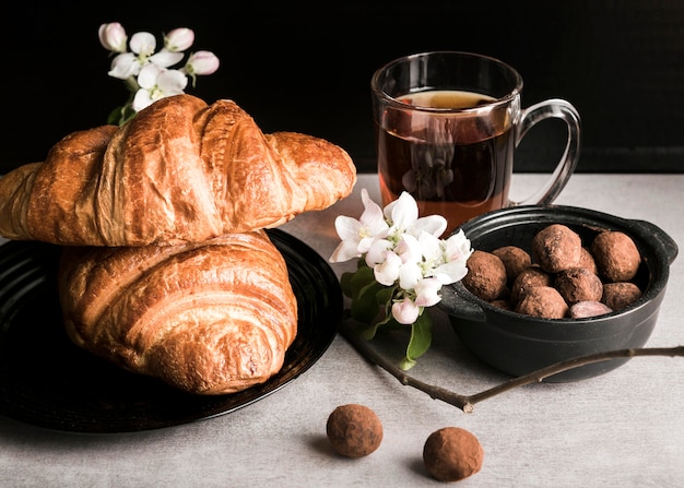 High angle croissants and chocolate candies