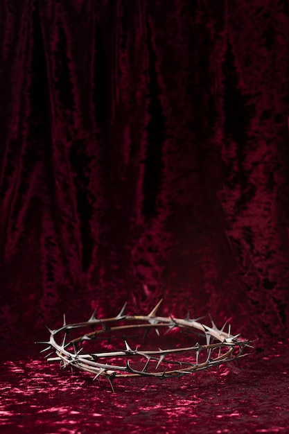 High angle crown of thorns and red cloth