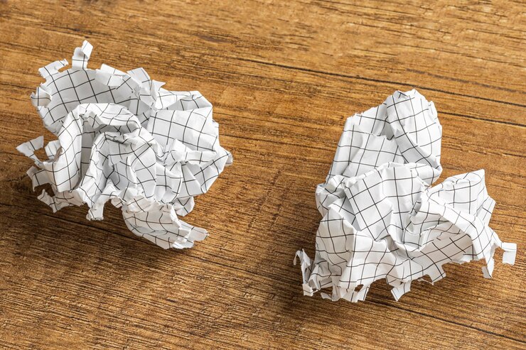 Free Photo high angle of crumpled paper