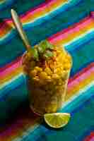 Free photo high angle cup with delicious esquites