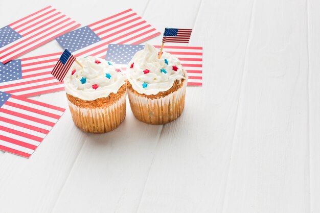 High angle of cupcakes with american flags and copy space