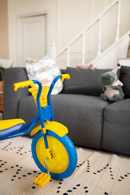 High angle cute tricycle in living room