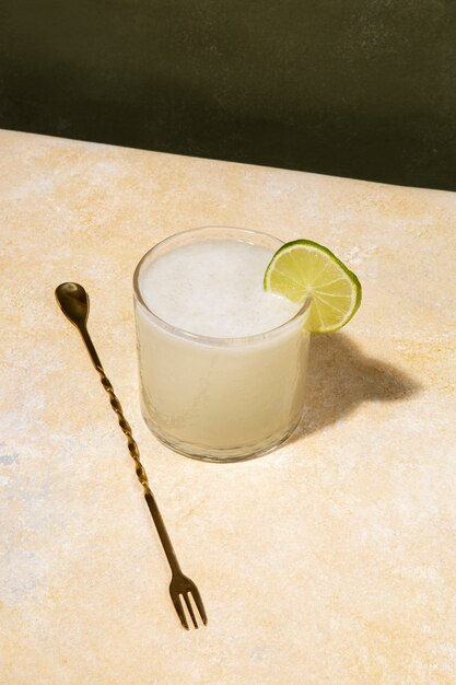 High angle daiquiri cocktail with lime