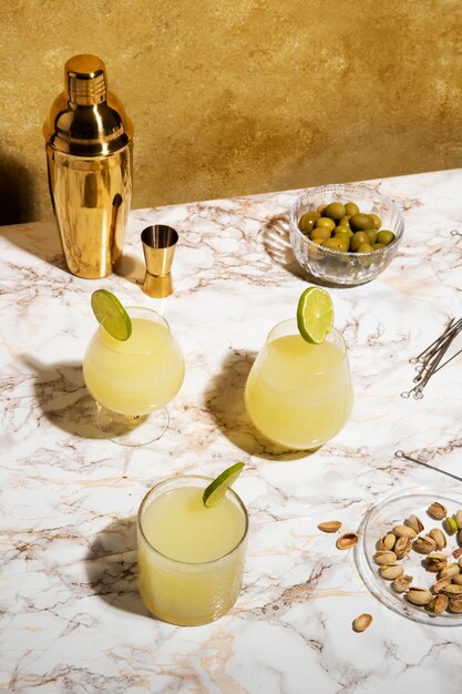 high angle daiquiri cocktails with lime slices