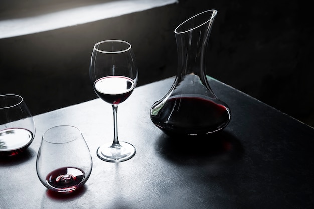 High angle decanter and wine glasses arrangement