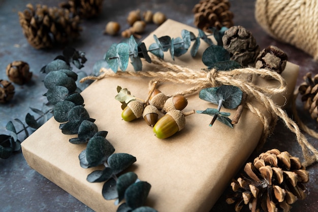 High angle decoration with present and acorns