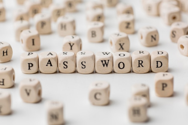 High angle of defocused wooden cubes with password